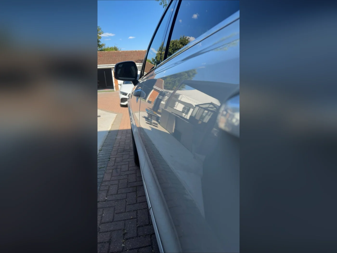 After — door panel repaired, factory paint intact