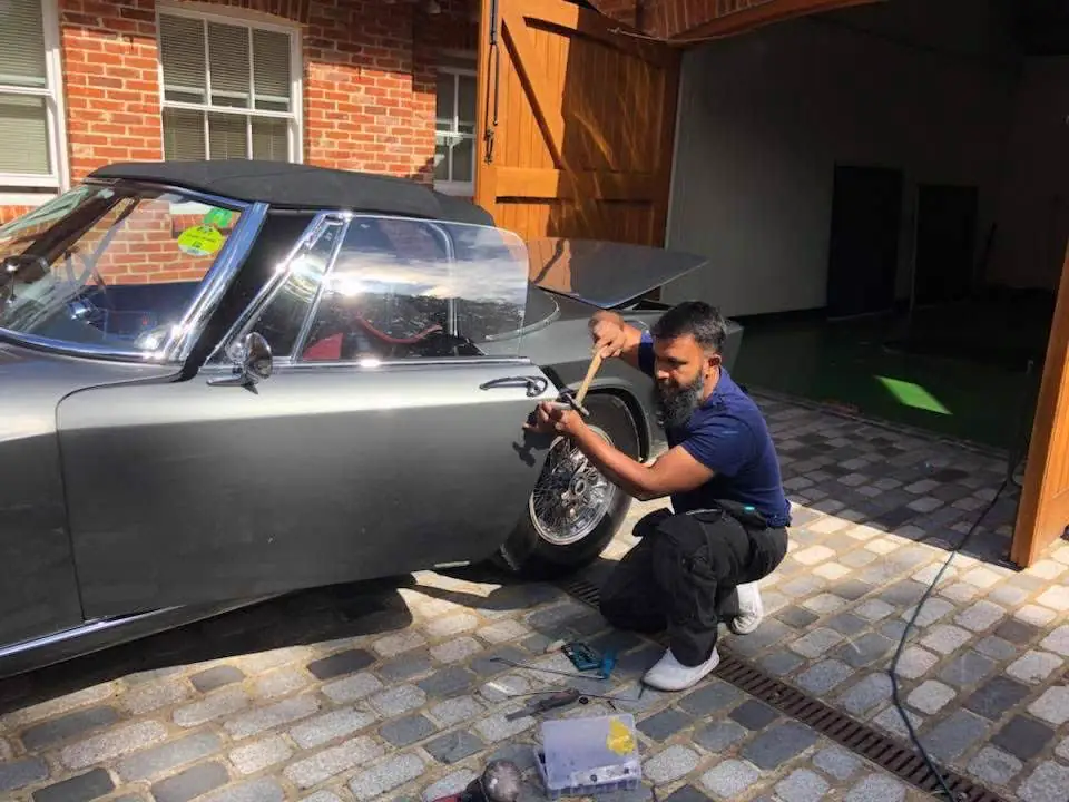 MO working on a classic car